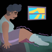 Adult with restless leg syndrome sitting on bed in dark room with little sunlight