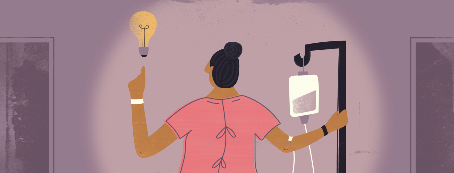 a woman in a hospital gown holding onto her IV pole and pointing to a lightbulb above her