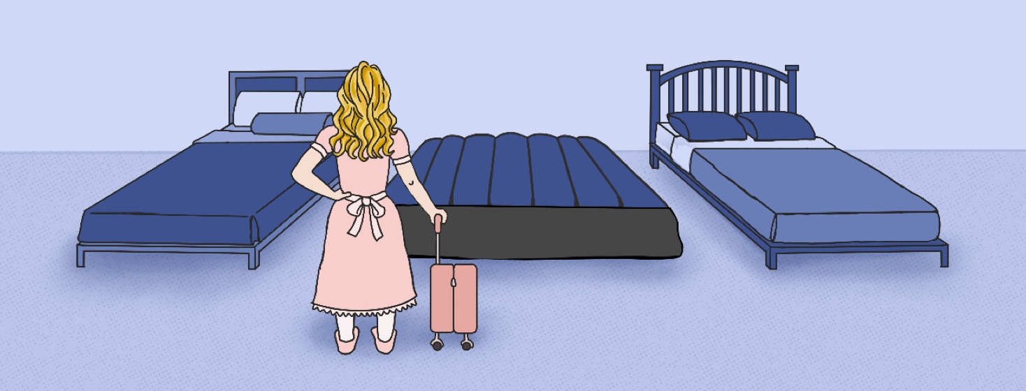 Adult Goldilocks with a hand on her hip, rolling luggage travel bag, looking at three different beds